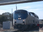 AMTK 46  17Feb2010  NB Train 22 (Texas Eagle) Over the Diamond (UP-CapMetro)